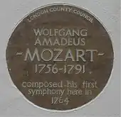  Circular plate inscribed: "London County Council: Wolfgang Amadeus Mozart 1756–1791 composed his first symphony here in 1794"