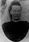 Mortuary photograph of Stride: a woman with angular features and a wide mouth