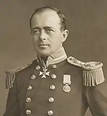 A man in ceremonial military uniform.